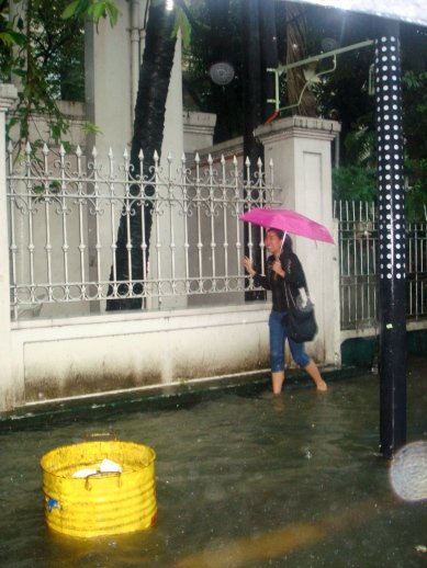 Braving the flood water of Padre Faura. Gross.